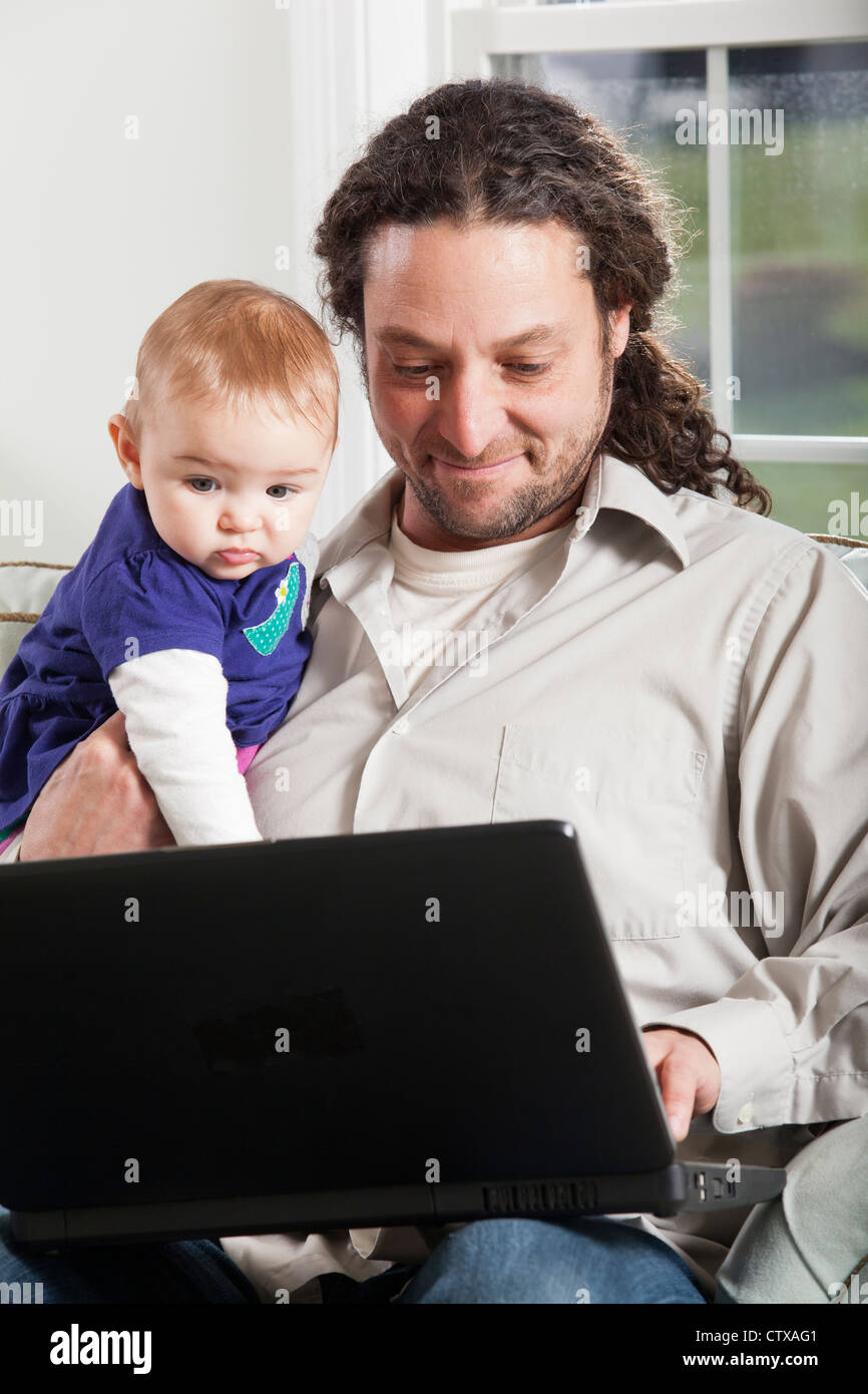 Child using computer home hi-res stock photography and images - Alamy