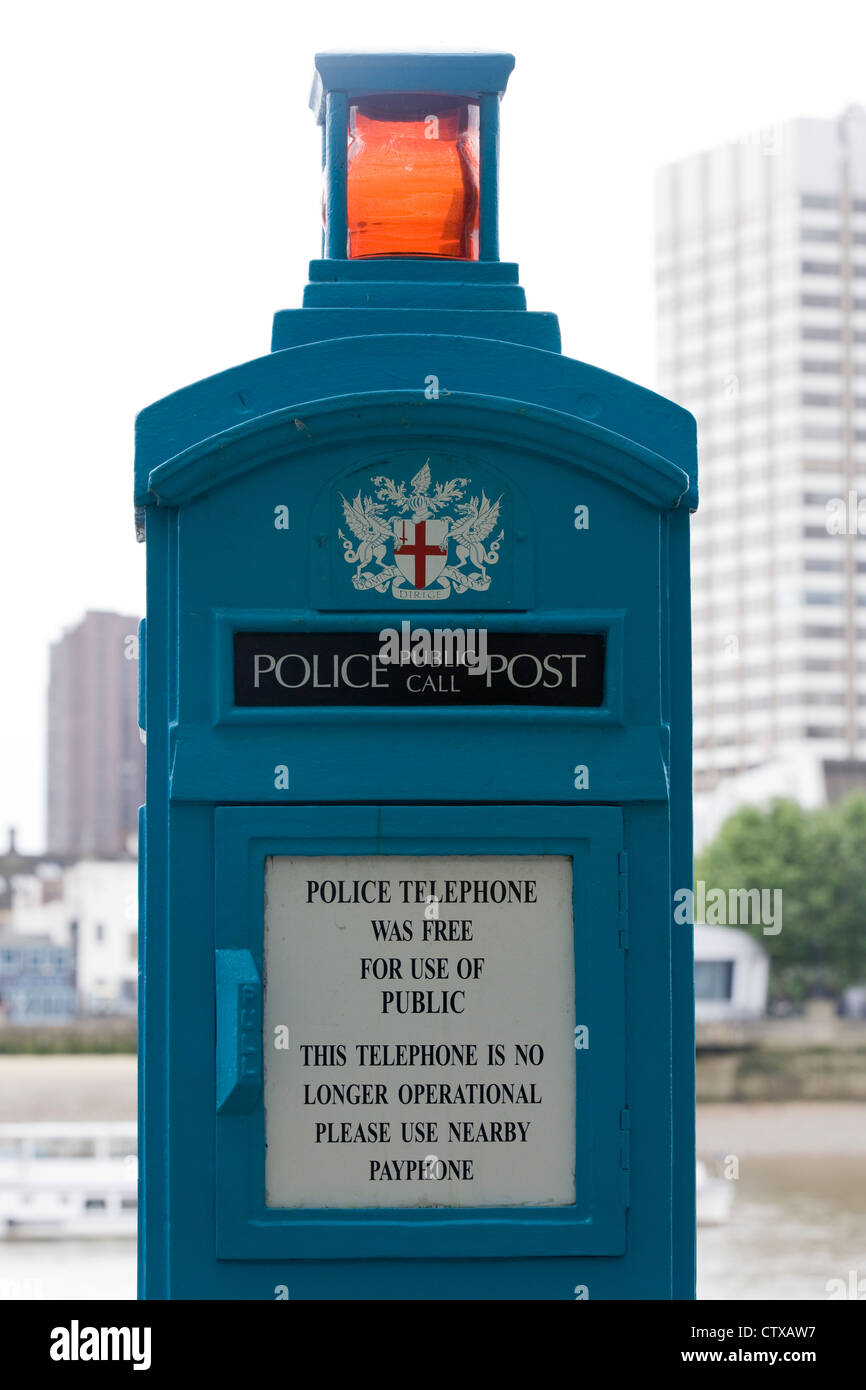 Police Public Post call box on the river Thames England Stock Photo
