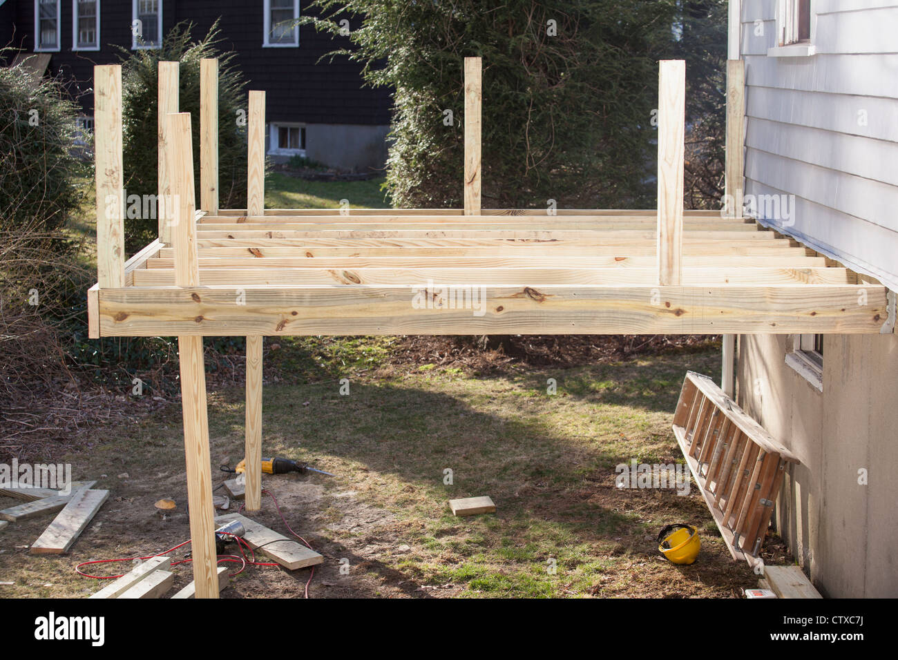 Pressure treated deck under construction on home Stock Photo