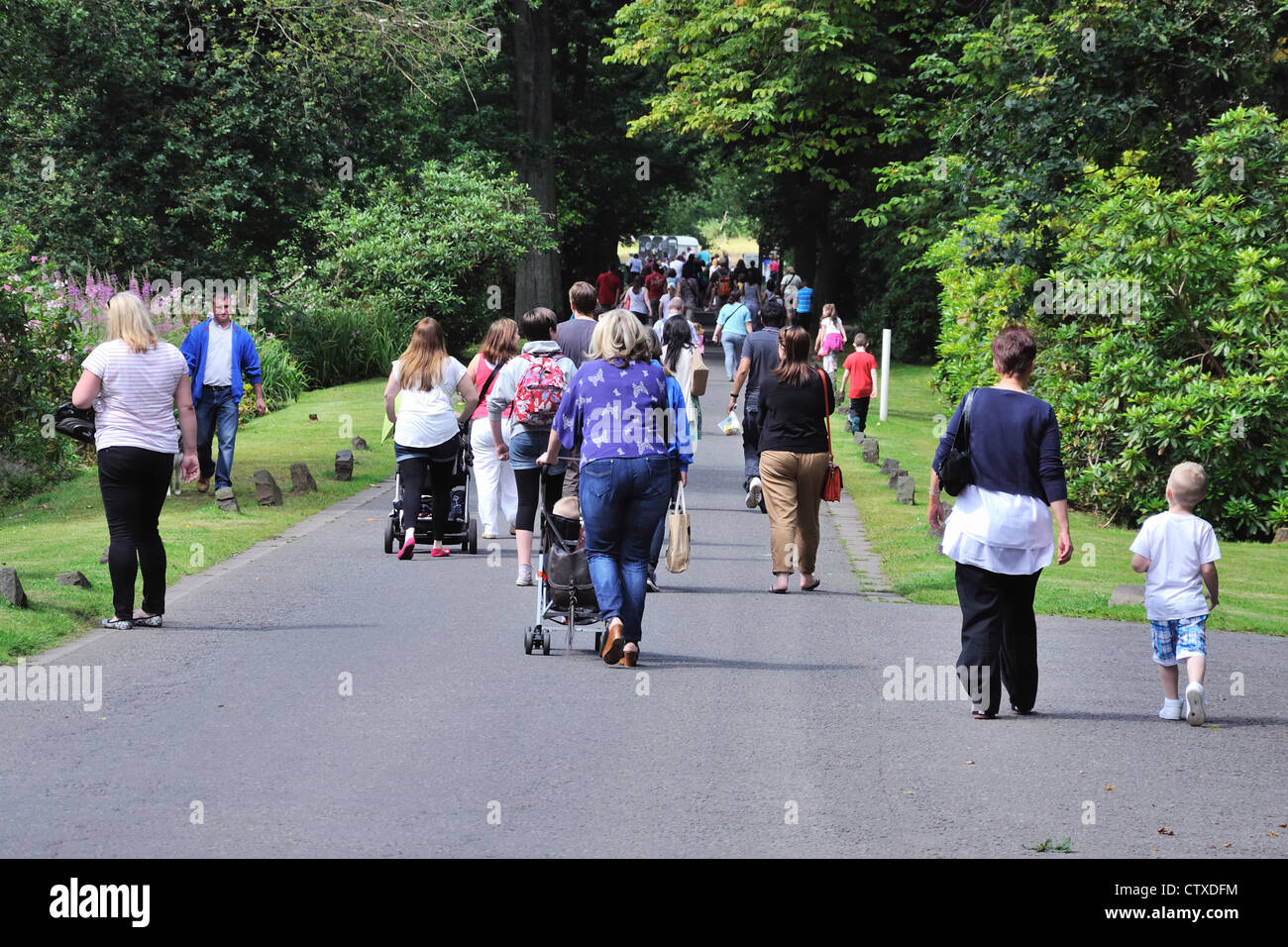 People walking to the family day event in Pollok Park, Glasgow, Scotland Stock Photo