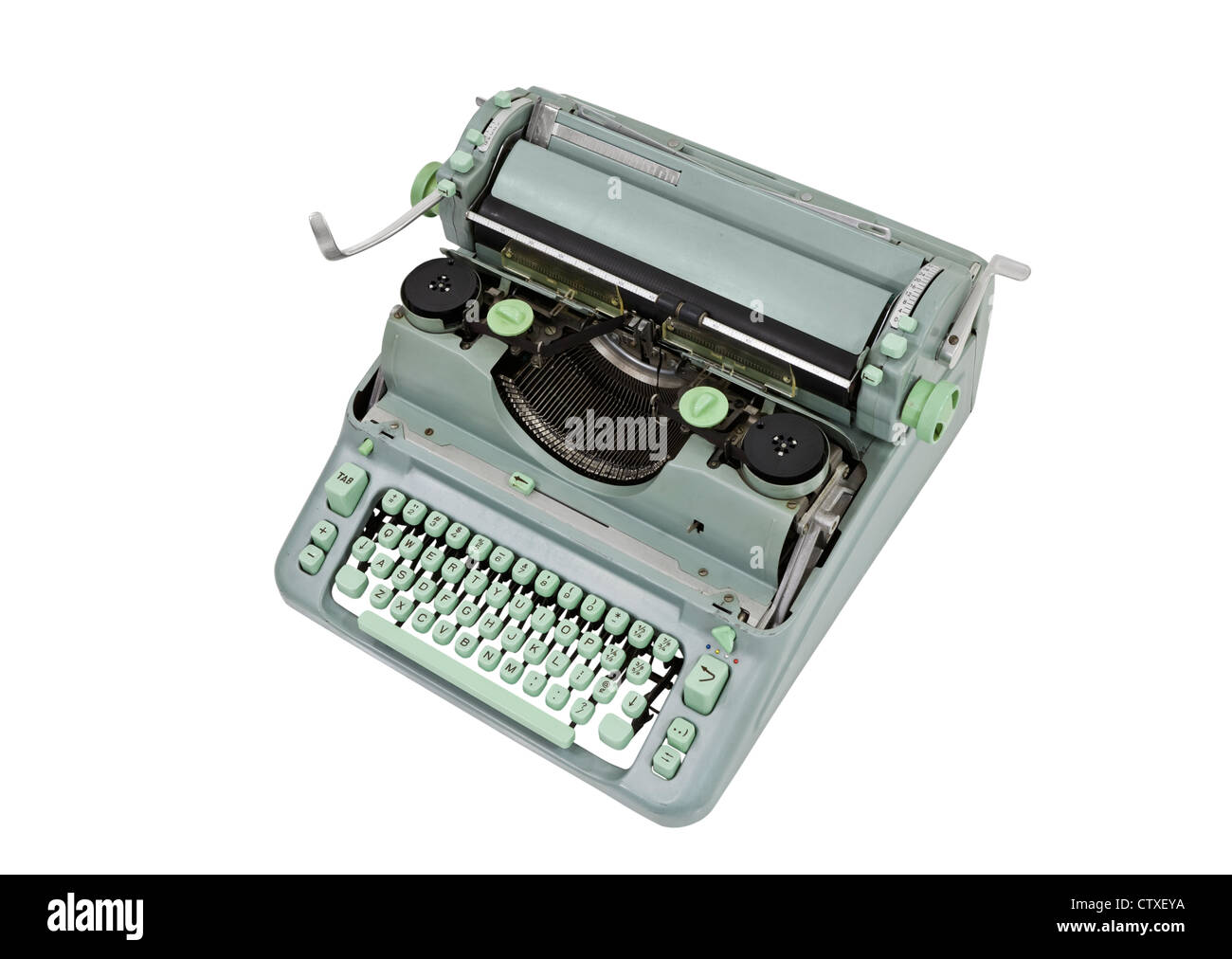 Vintage manual green metal typewriter isolated with clipping path Stock