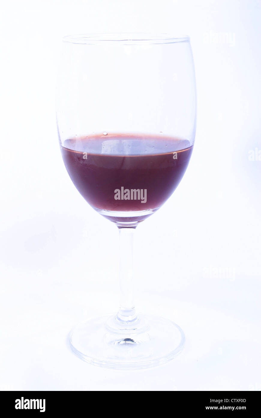 Glass of red wine on a white background Stock Photo - Alamy