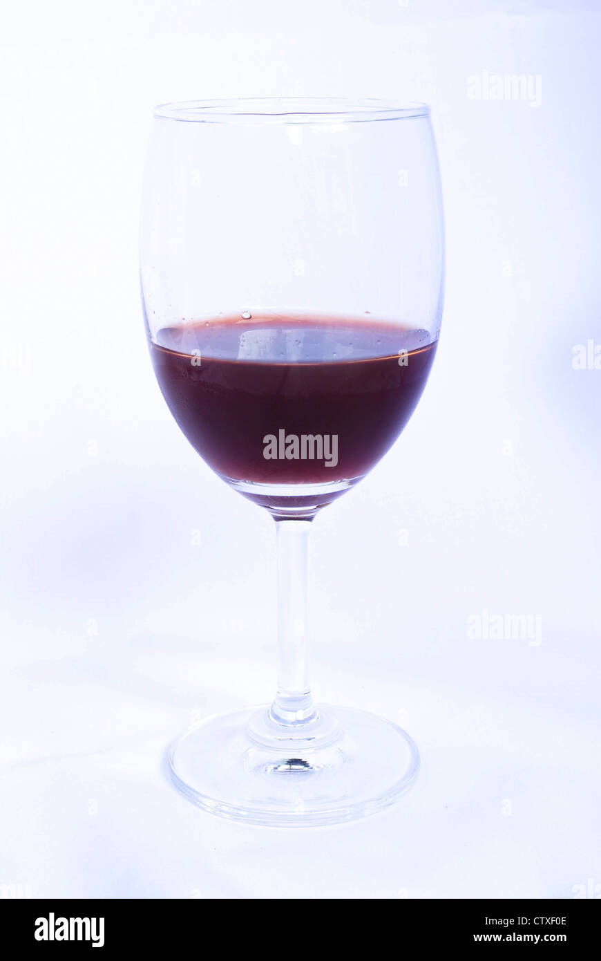 Glass of red wine on a white background Stock Photo - Alamy