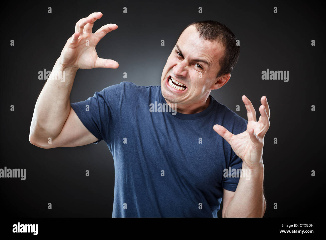 Portrait of an extremely angry young man Stock Photo