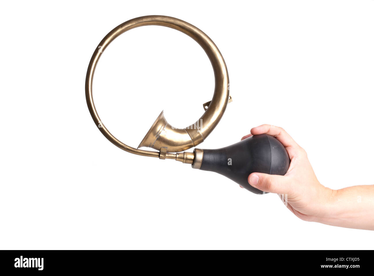 Vintage horn held in hand. Old type of carhorn that you squeeze by
