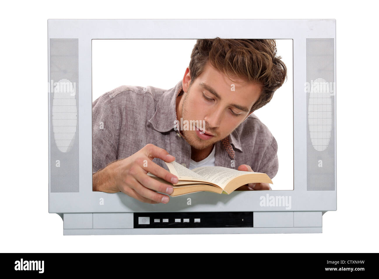 Man with book behind TV frame Stock Photo