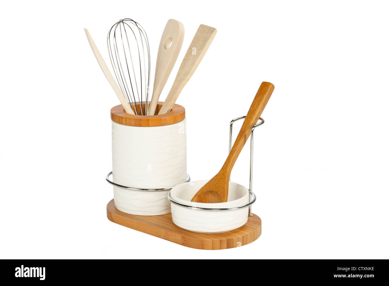 https://c8.alamy.com/comp/CTXNKE/kitchen-tools-wooden-cutlery-in-ceramic-pot-CTXNKE.jpg
