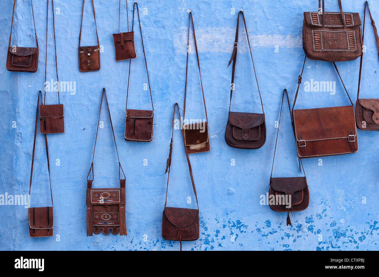 leather bags in the blue city of Chefchaouen, Morocco Stock Photo - Alamy