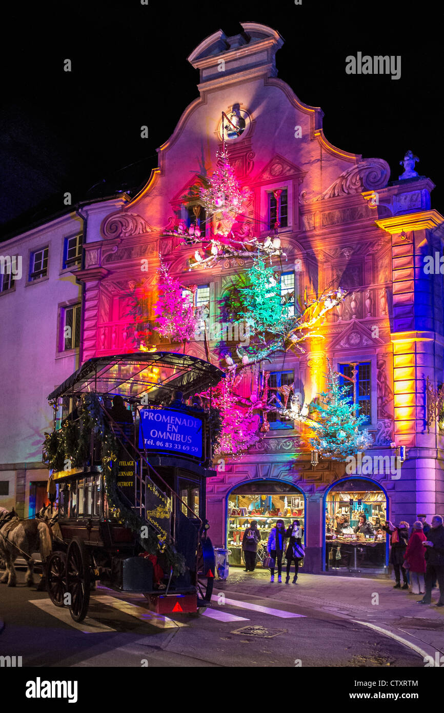 Renaissance house facade 16th century, trompe-l'œil painting, Christmas decoration, festive illuminations, night, Strasbourg, Alsace, France, Europe, Stock Photo