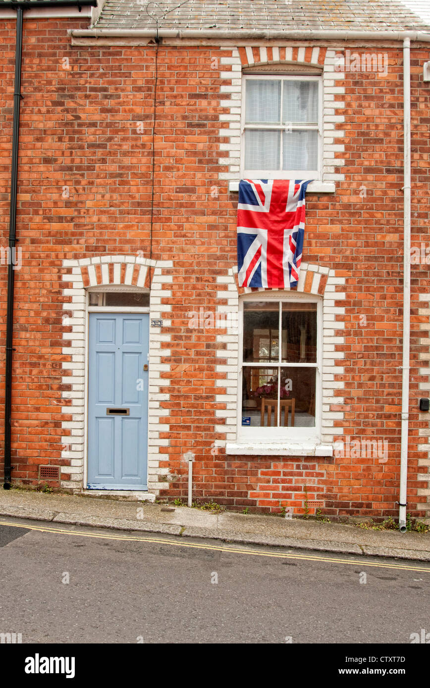 England flag hanging from window hi-res stock photography ...