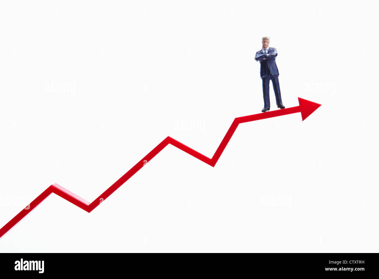 A man figure on red rising chart Stock Photo - Alamy