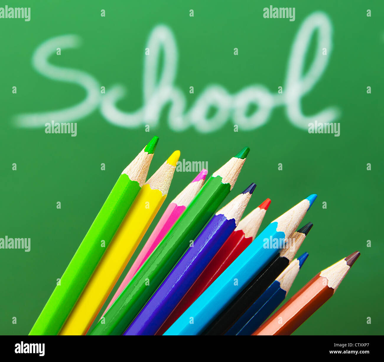 Back to school concept, green chalkboard with handwriting and set of ...