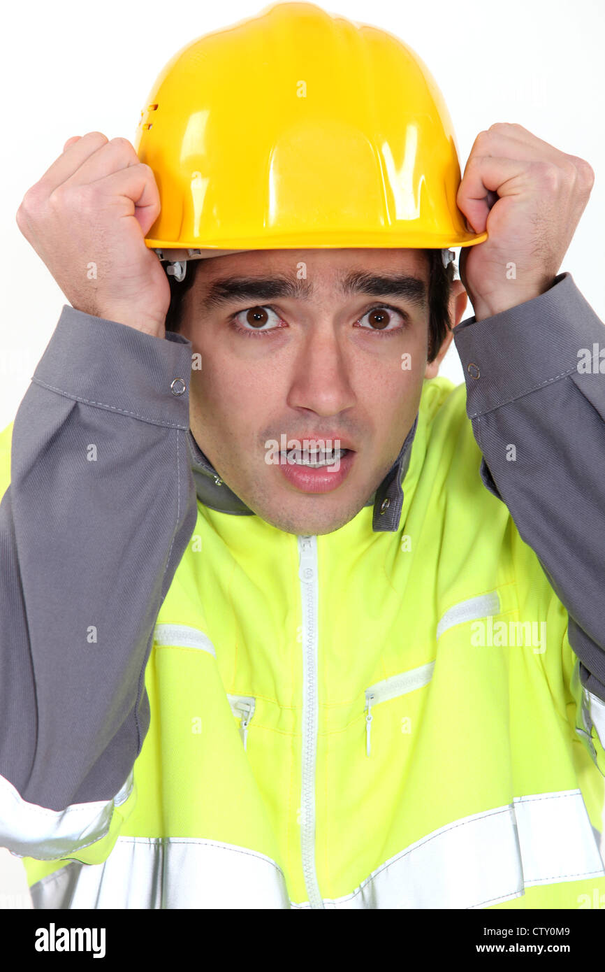 Scared builder Stock Photo