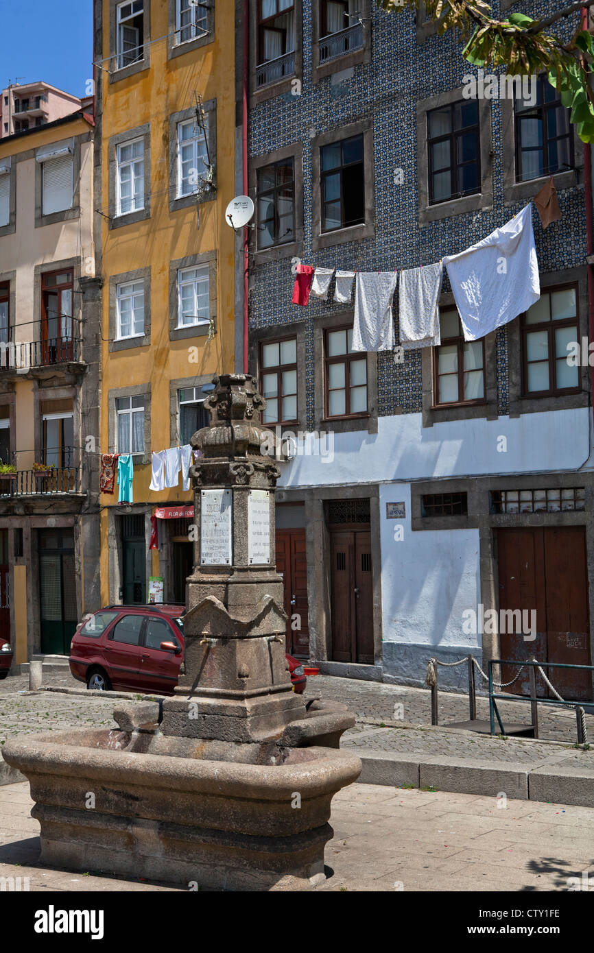 A small place and linen dryning on windows - typical quarter of Porto, Oporto, Portugal, South Europe, EU Stock Photo