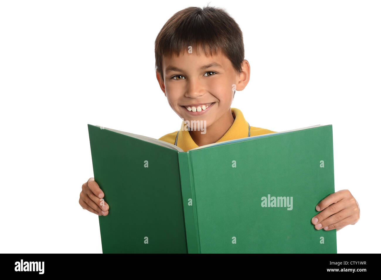 Portrait of young boy holding book isolated over white background Stock ...