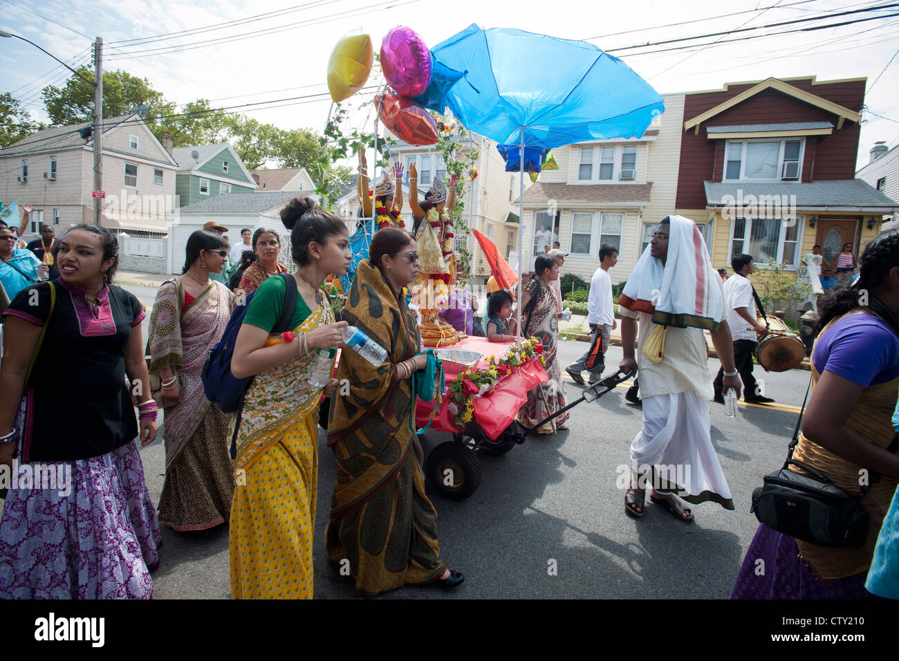 Hundreds of members of the Hare Krishna religion march in their annual Ratha Yatra parade. Stock Photo