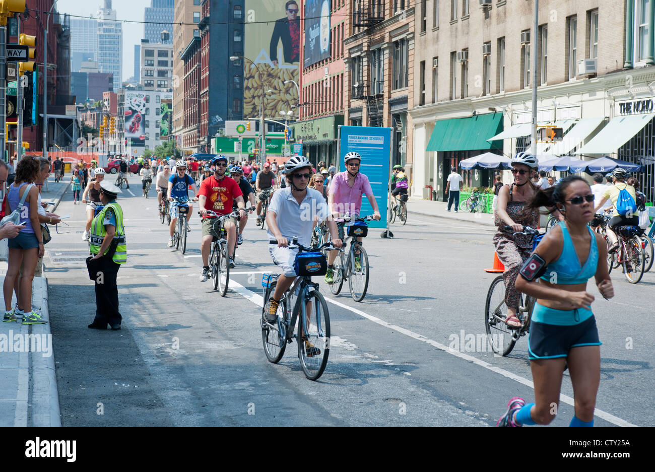 Bicycles and pedestrians take to the streets on Saturday, August 4, 2012 for the 5th annual New York Summer Streets event Stock Photo