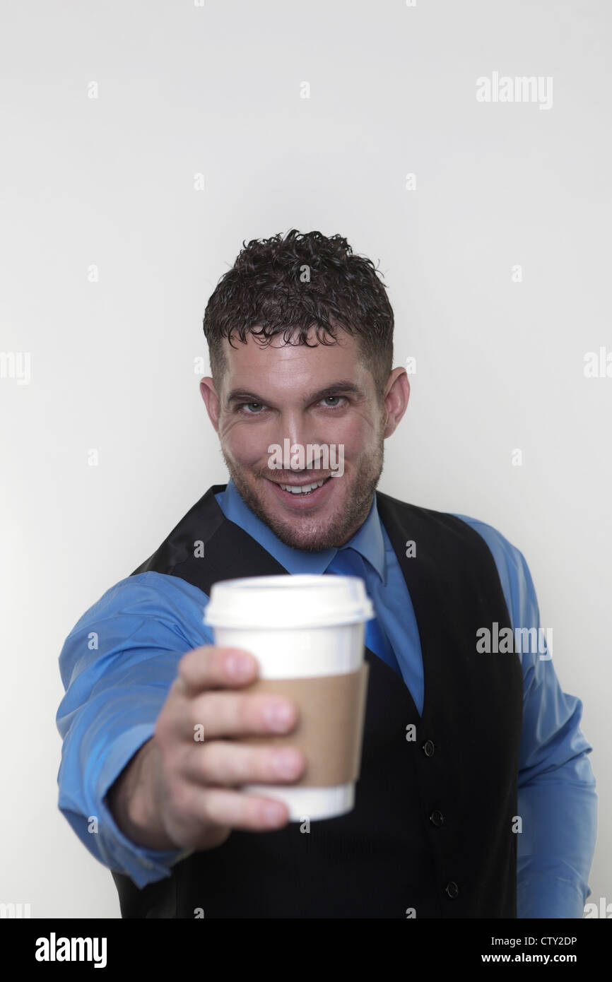 portrait of man holding a paper cup of tea or coffee Stock Photo - Alamy