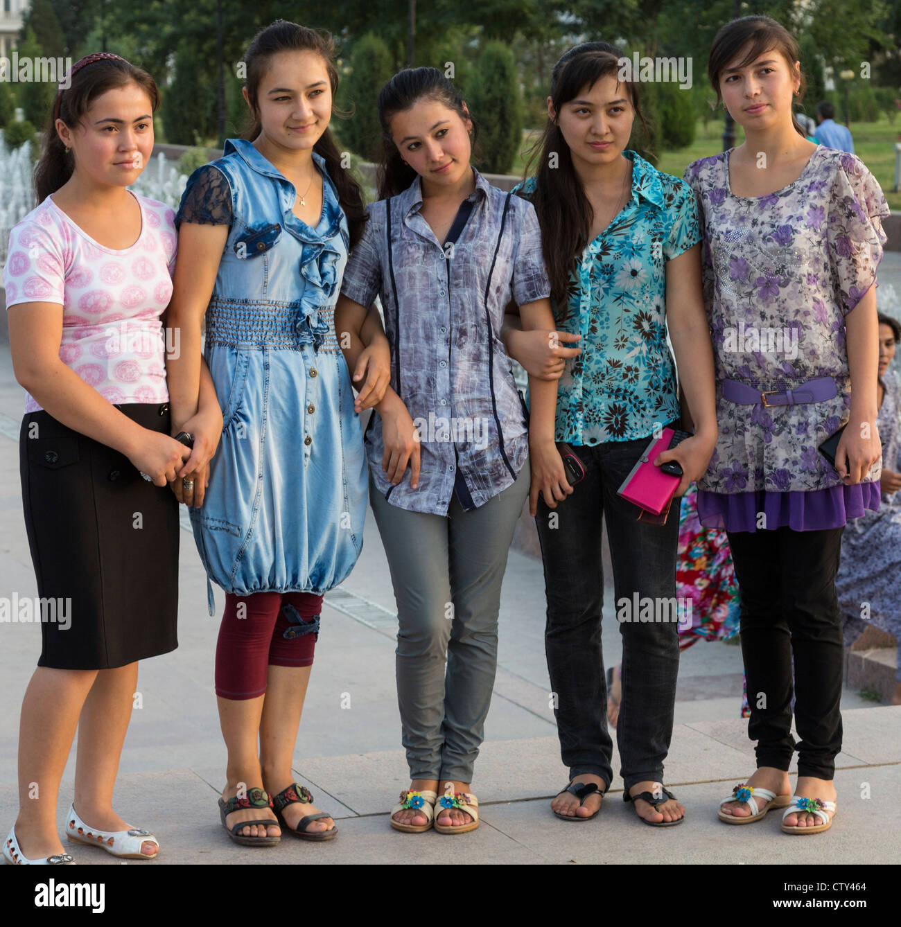 Tajik girls posing in Central Park, Dushanbe, Tajikistan Stock Photo