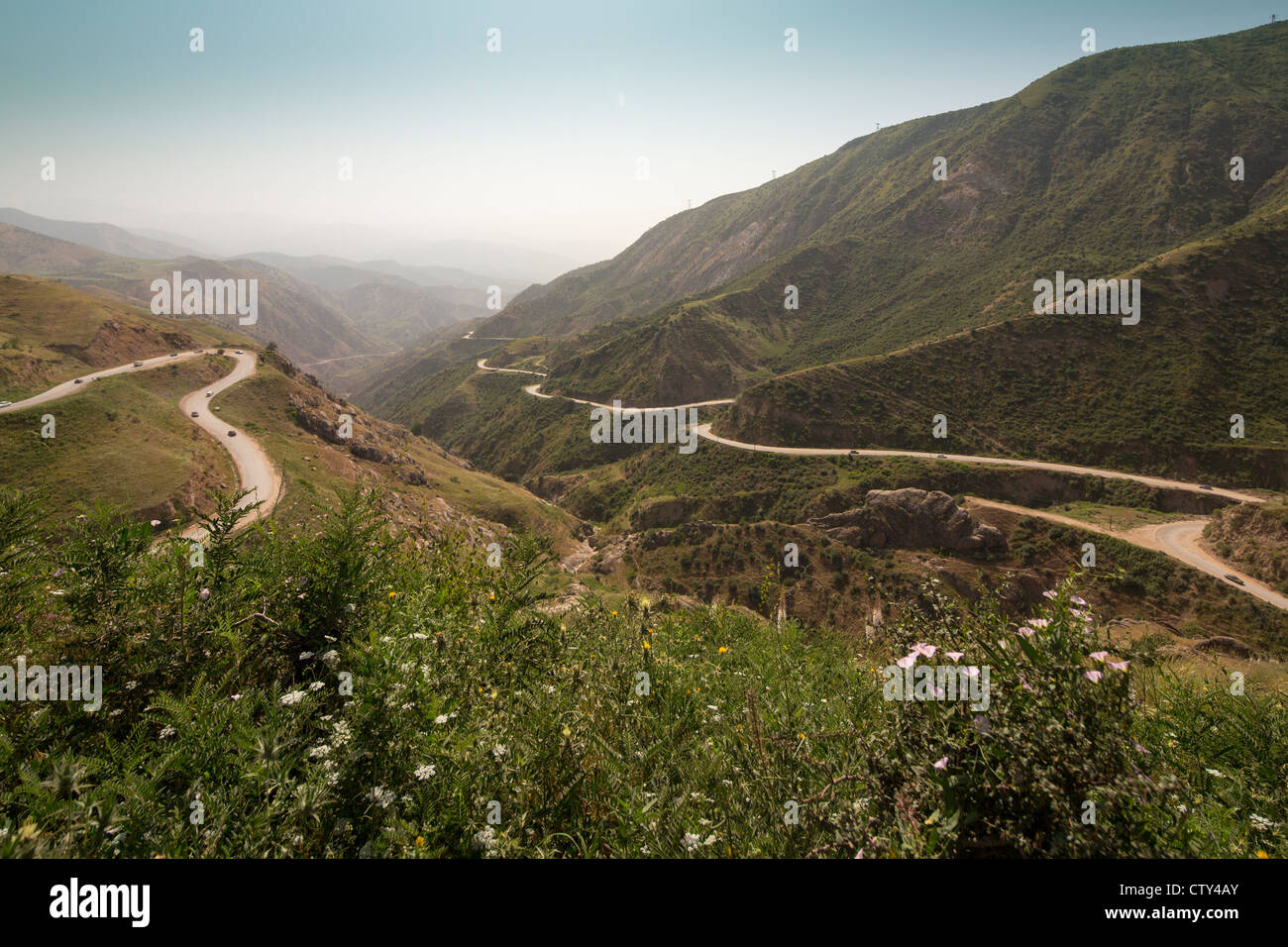 view of mountain road with haripin bends, Dushanbe Holbok road, Tajikistan Stock Photo
