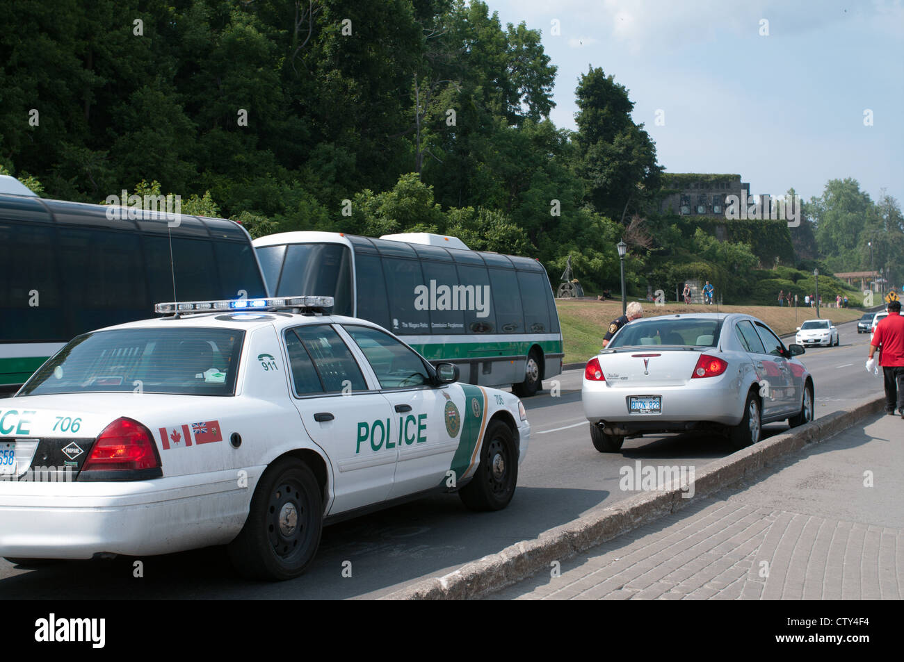 Police pulling a car over, Niagara Falls, Ontario, Canada Stock Photo