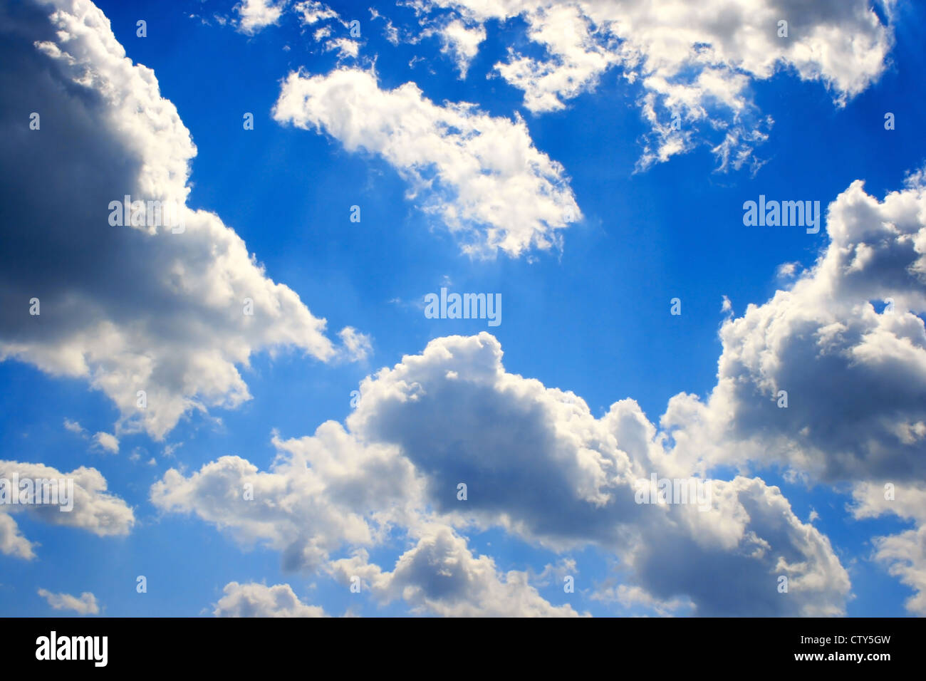 White and gray beautiful clouds in blue sky Stock Photo - Alamy