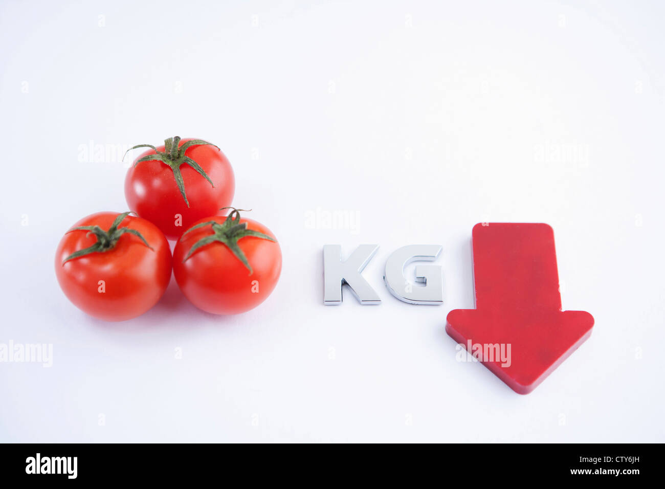 Tomatoes and low calorie indicator Stock Photo Alamy