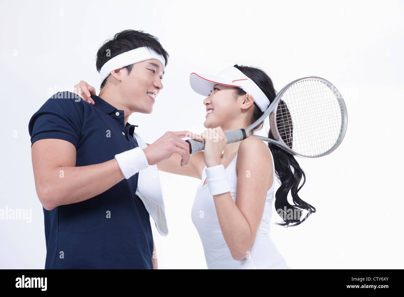 Male and female tennis players facing together Stock Photo Alamy