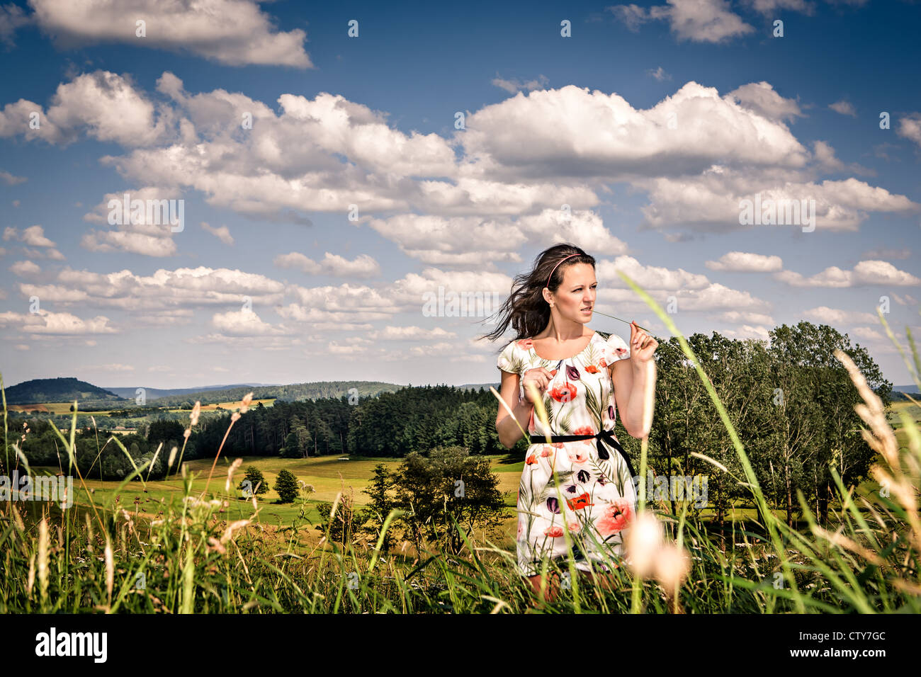 the outdoor portrait of a young woman Stock Photo - Alamy