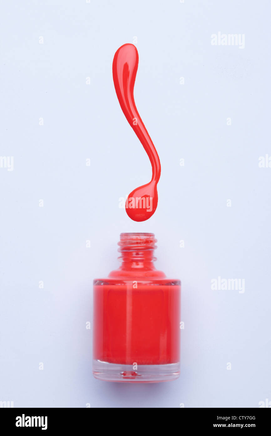Orange nail polish Stock Photo - Alamy