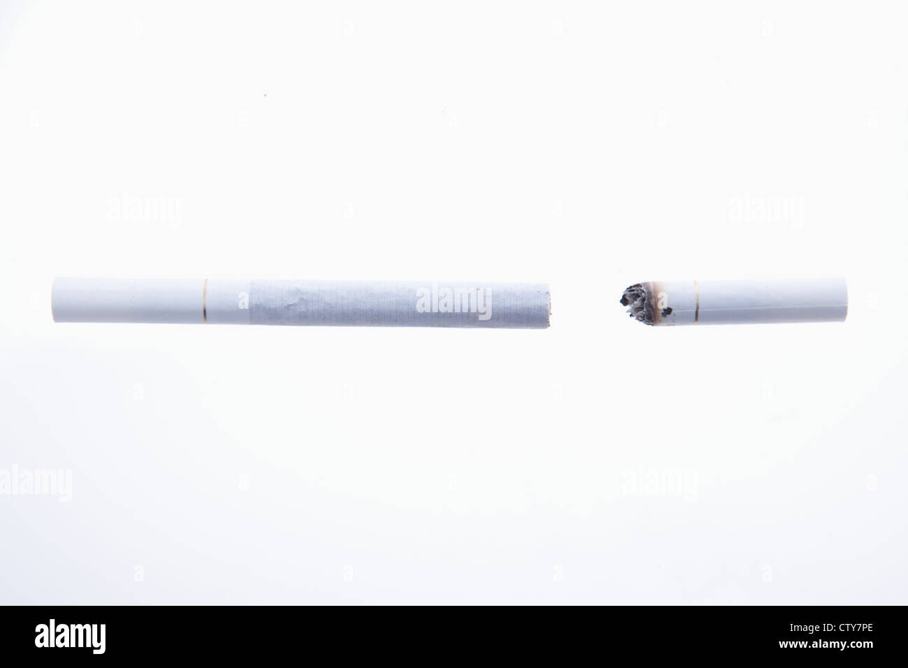 a-long-cigarette-and-a-short-cigarettes-stock-photo-alamy