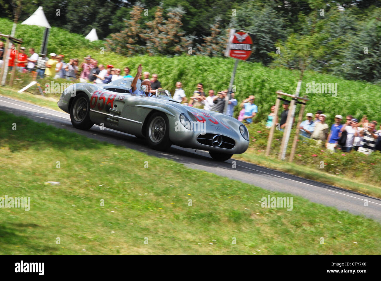 Stirling Moss in 1955 Mercedes-Benz 300 SLR at Classic Days 2012, Schloss Dyck Germany Stock Photo