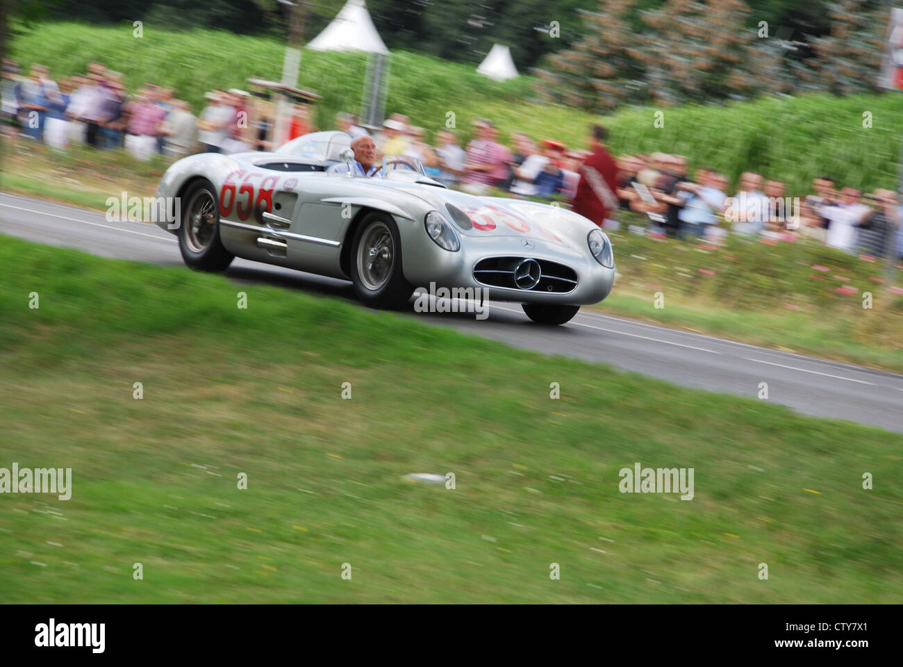 Stirling Moss in 1955 Mercedes-Benz 300 SLR at Classic Days 2012, Schloss Dyck Germany Stock Photo