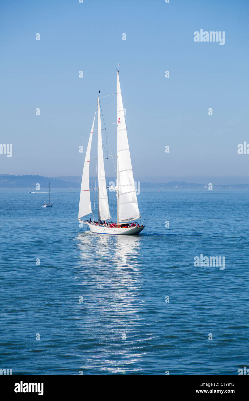 Yacht with three sails taken in the Solent, off Cowes in the Isle of Wight, in Cowes Week Stock Photo