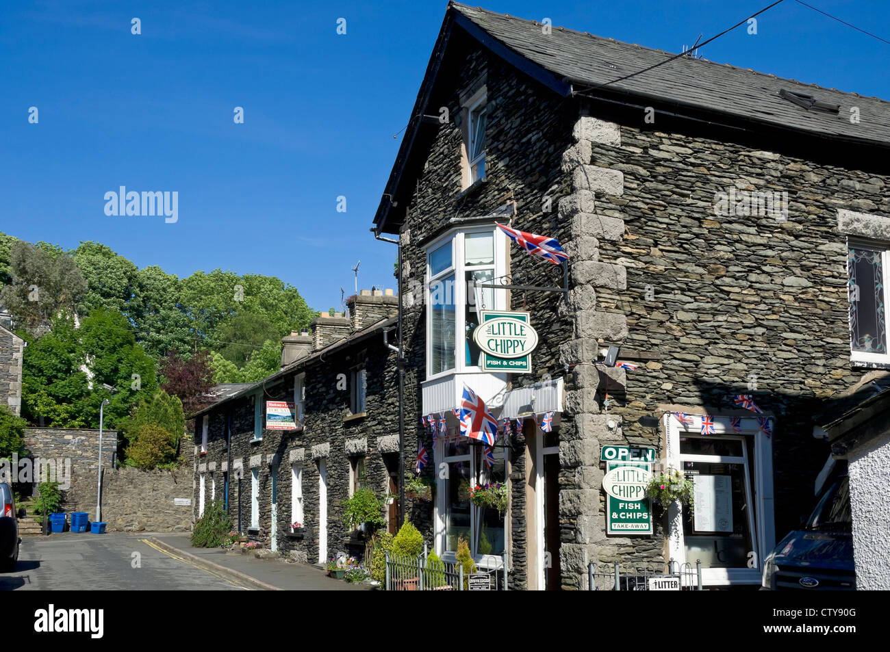 Businesses on Beech Street in summer Windermere Cumbria England UK United Kingdom GB Great Britain Stock Photo