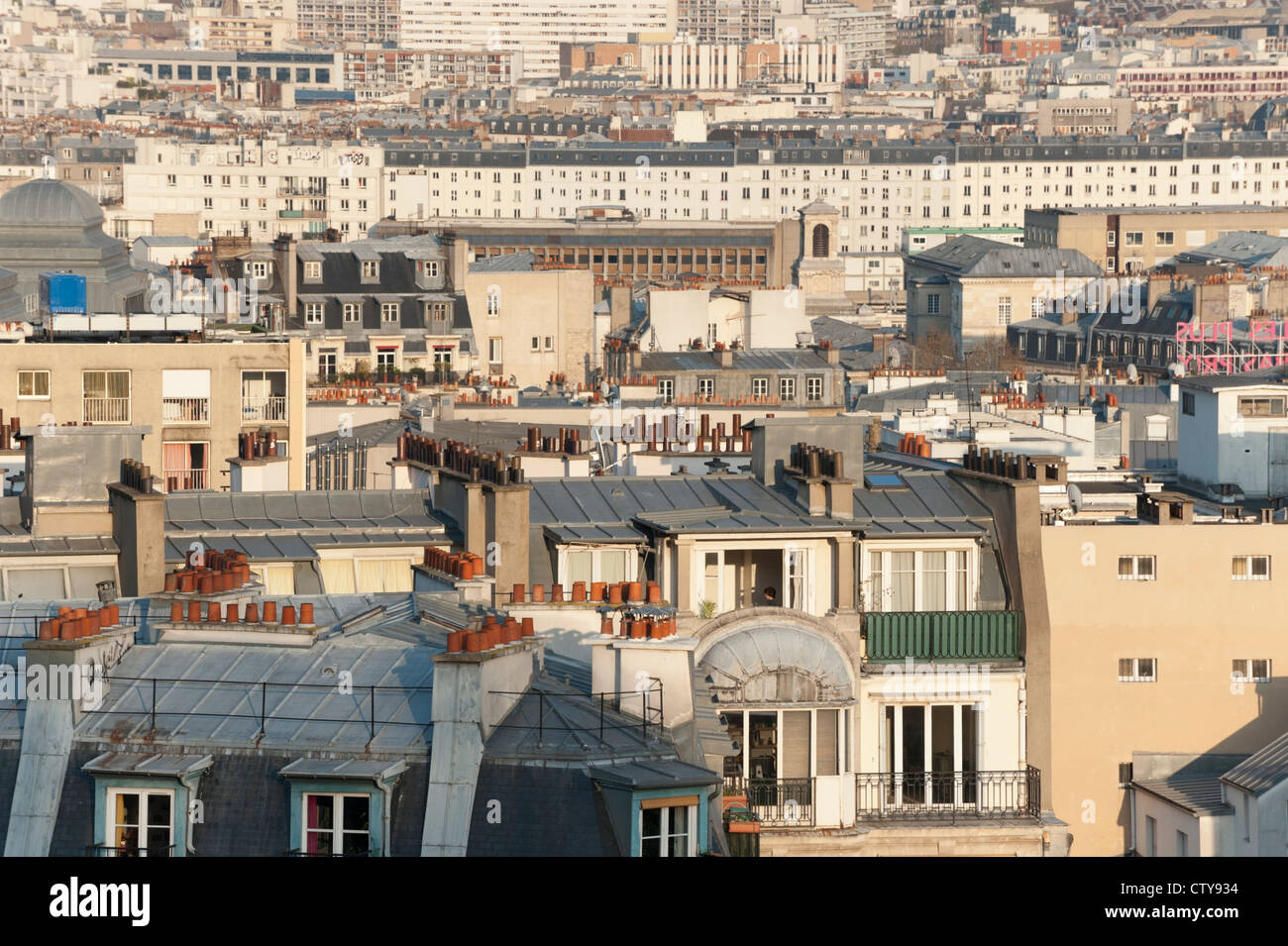 Rooftops of Paris in the early evening sunlight - France Stock Photo