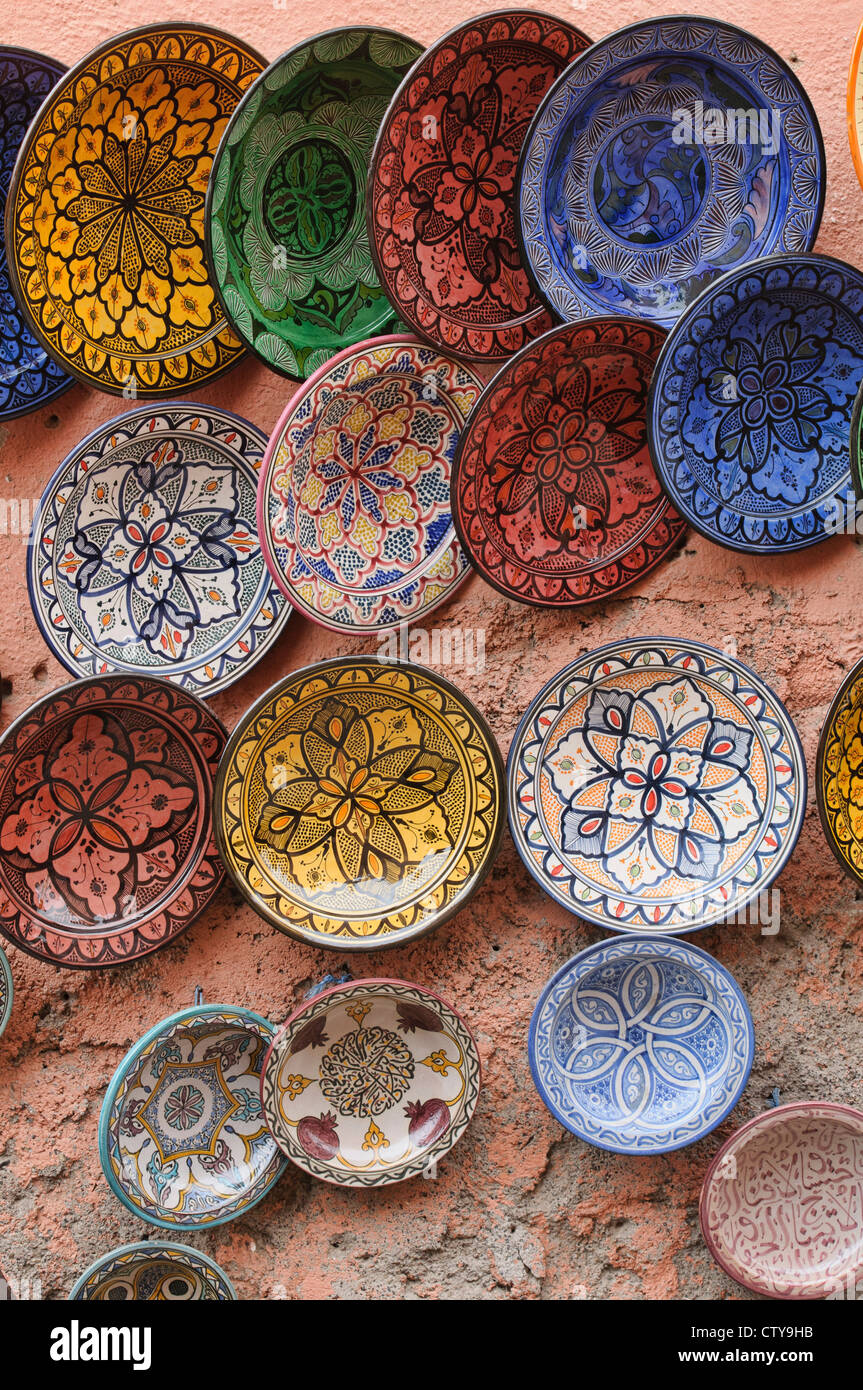 painted dishes for sale in the ancient medina in Marrakech, Morocco Stock Photo