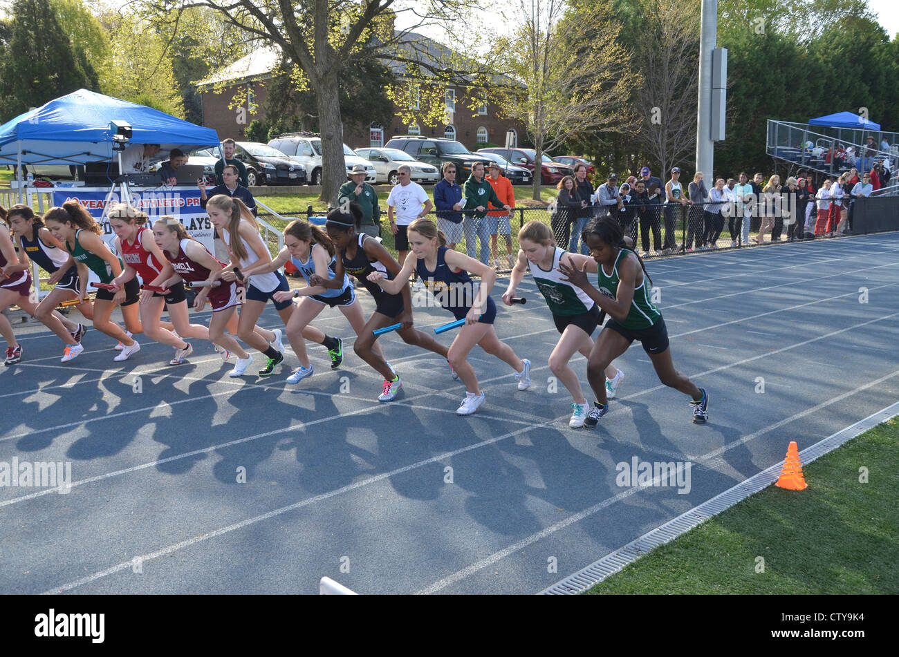 teens running in a high school track meet Stock Photo Alamy