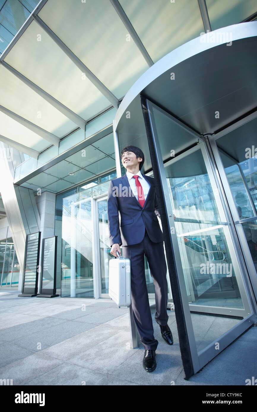 Man Rushing Out A Door Man walking out door hi-res stock photography and images - Alamy