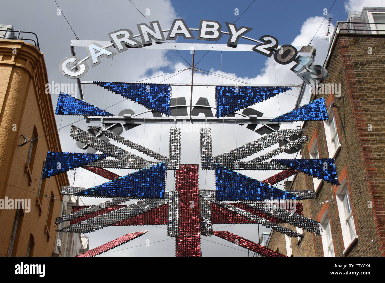 Fragmented Union jack hung above Carnaby Street London Stock Photo