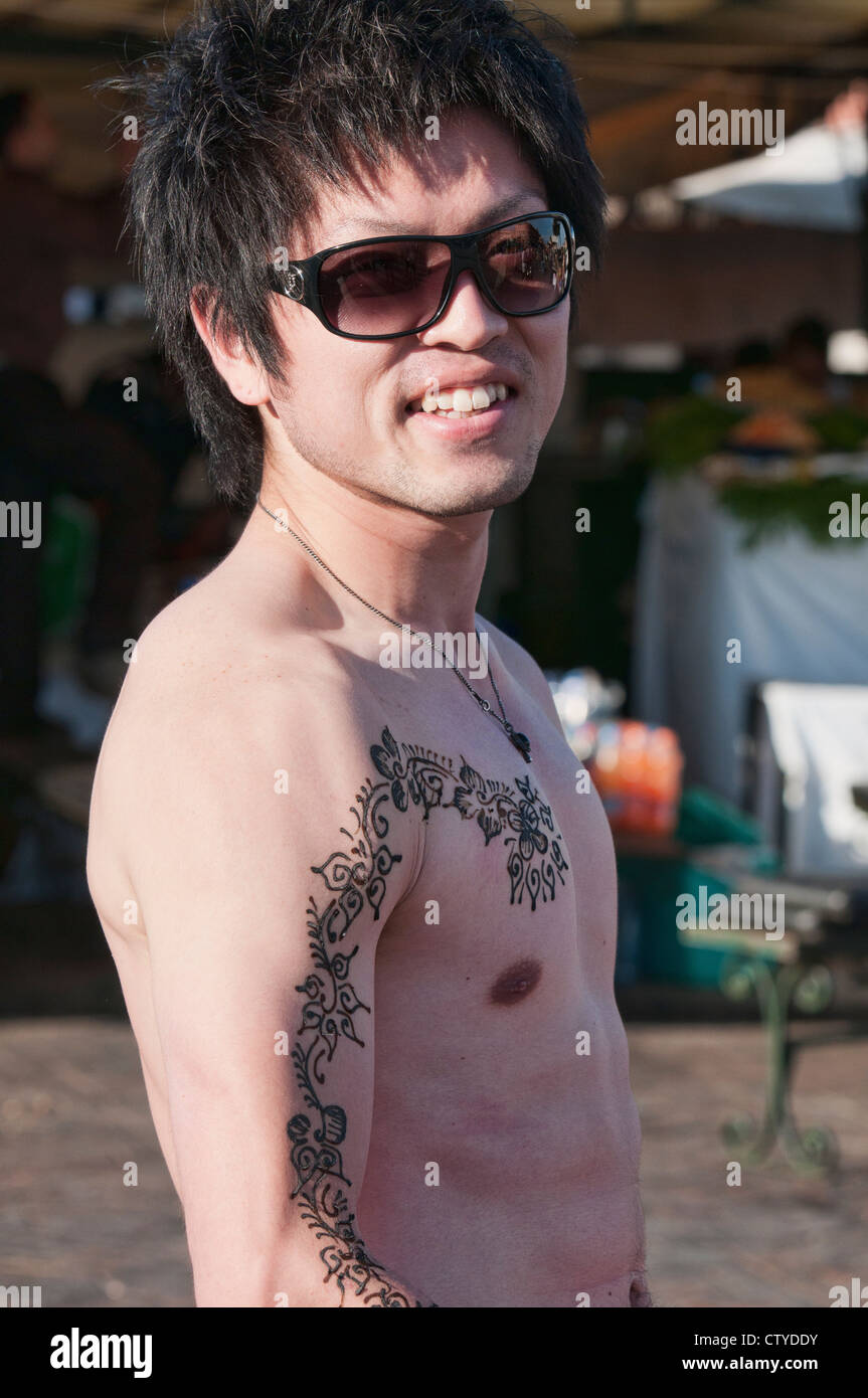 Japanese guy with a henna tattoo at the Djemma el Fna Square in Marrakech, Morocco Stock Photo - Alamy Japanese guy with a henna tattoo at the Djemma el Fna Square in Marrakech, Morocco Stock Photo - Alamy