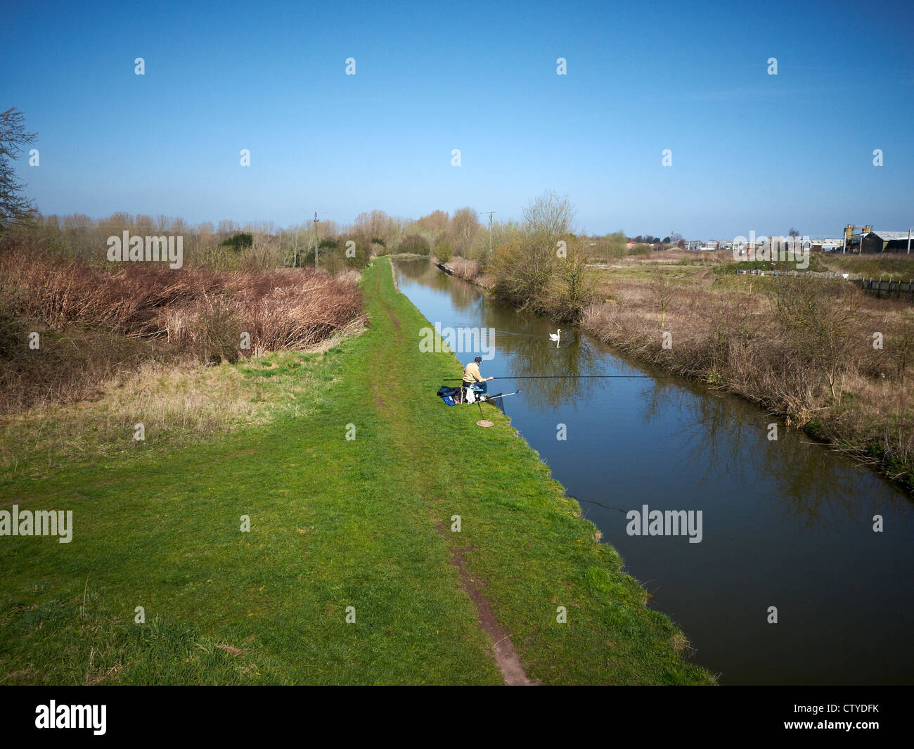 Fishing in the Trent and Mersey Canal in Cheshire UK Stock Photo