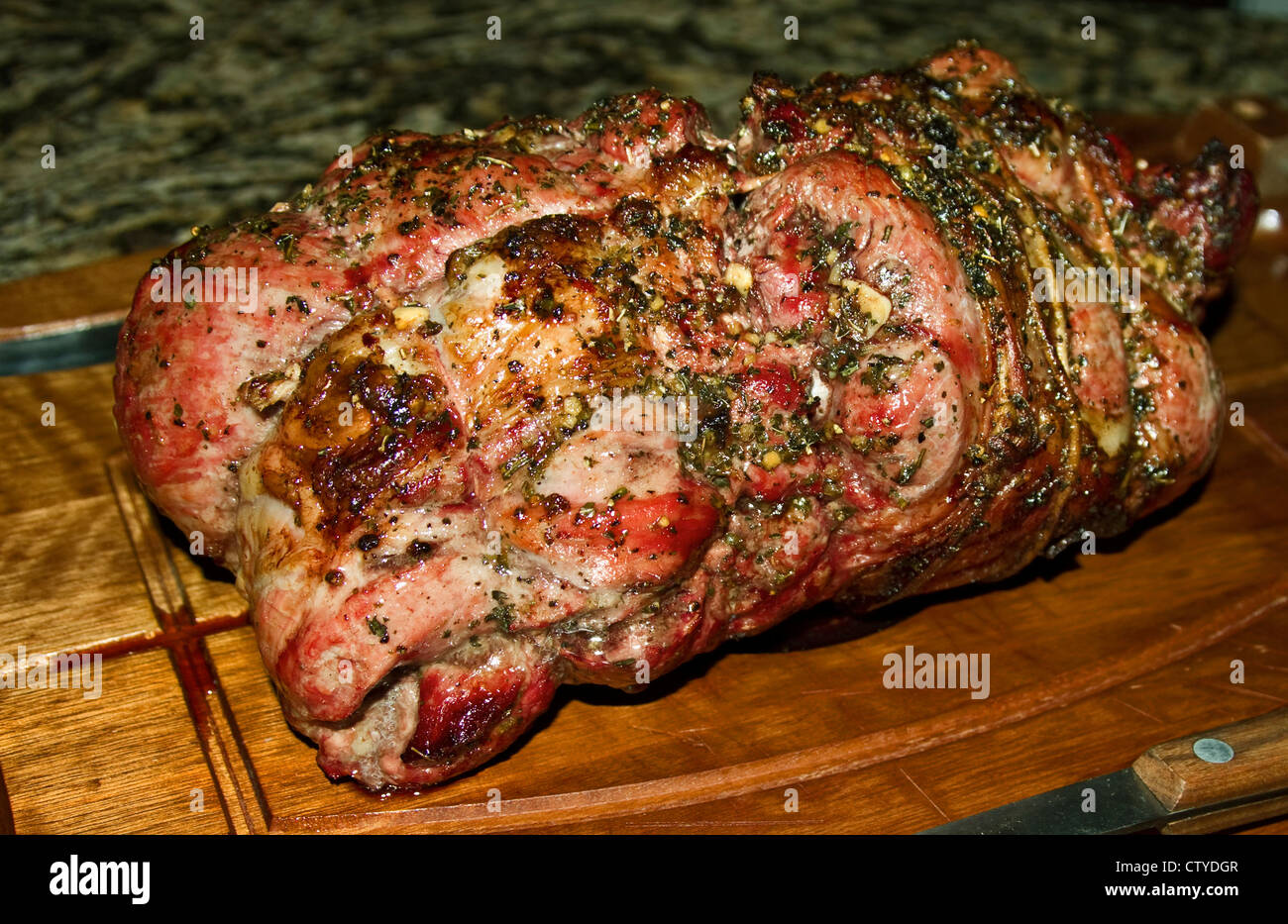 SEASONED BARBECUED BONELESS LAMB LEG Stock Photo Alamy