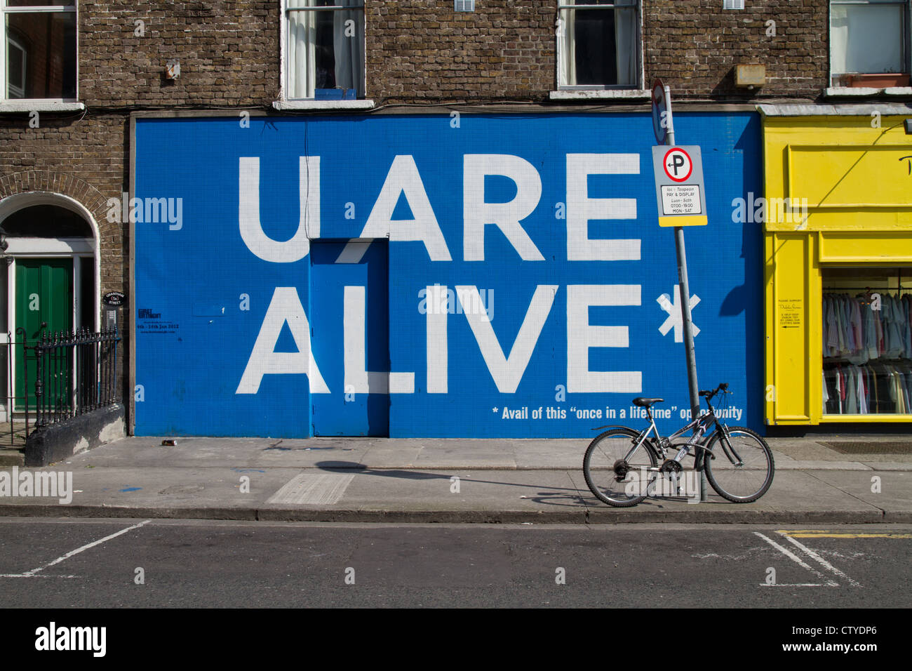 U Are Alive (Please avail of this once in a lifetime opportunity) Sign in Dublin Ireland Stock Photo