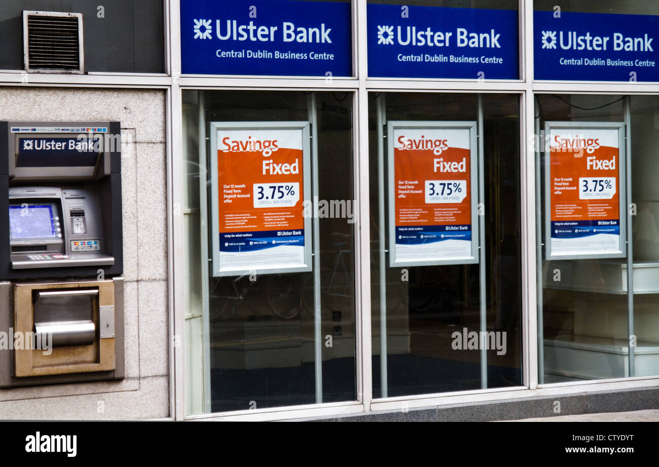 Two women walk past Ulster Bank in Dublin Ireland Stock Photo