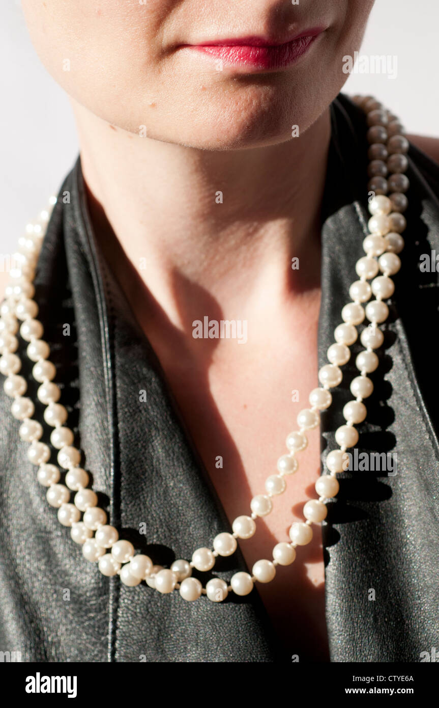 Young woman with a pearl necklace Stock Photo