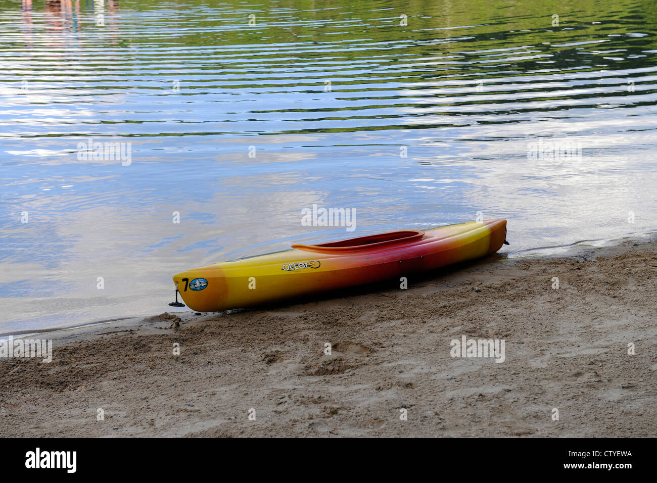 Purity Lake. Purity Spring Resort. East Madison, New Hampshire. Otter kayak on beach Stock Photo