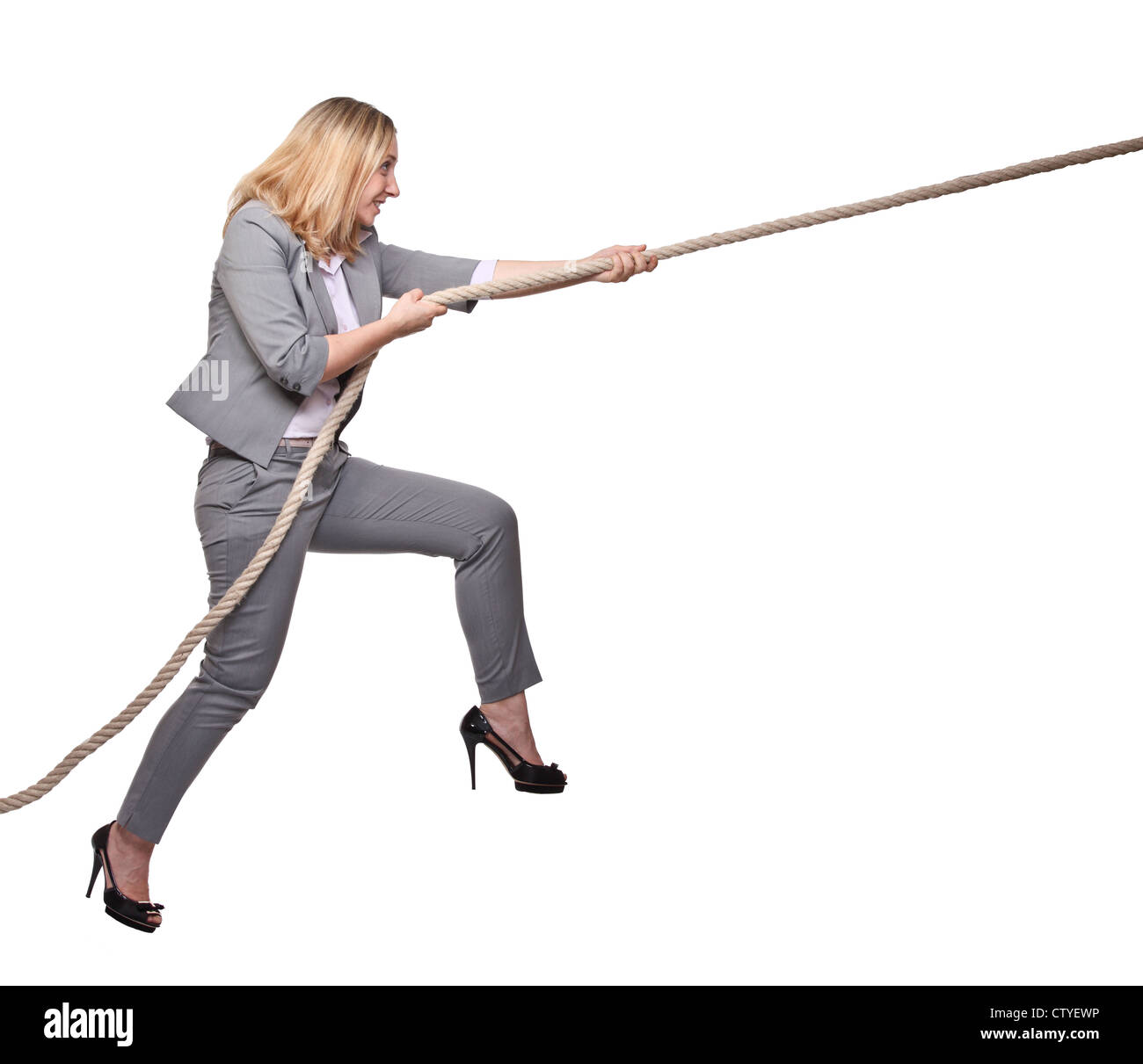 woman pull the rope on white background Stock Photo - Alamy