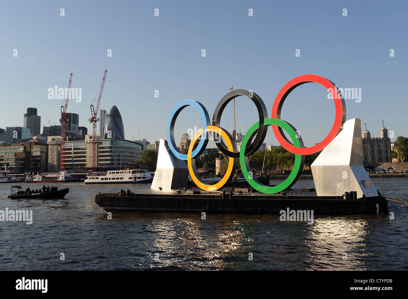 Olympic rings floating on a pontoon in the river thames , london Stock Photo