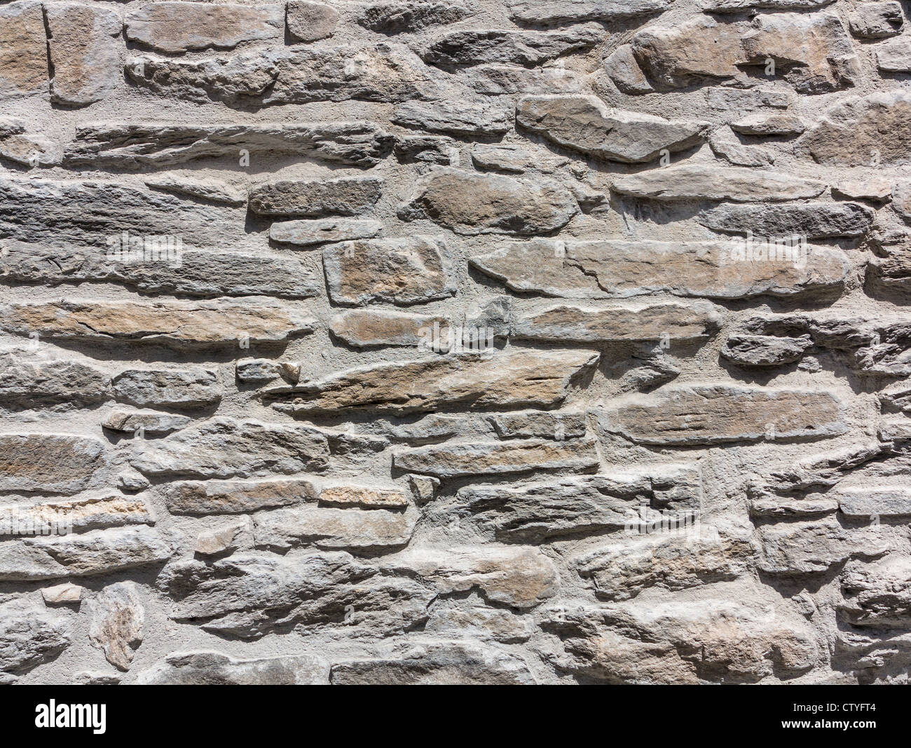 A background image of a stone wall Stock Photo